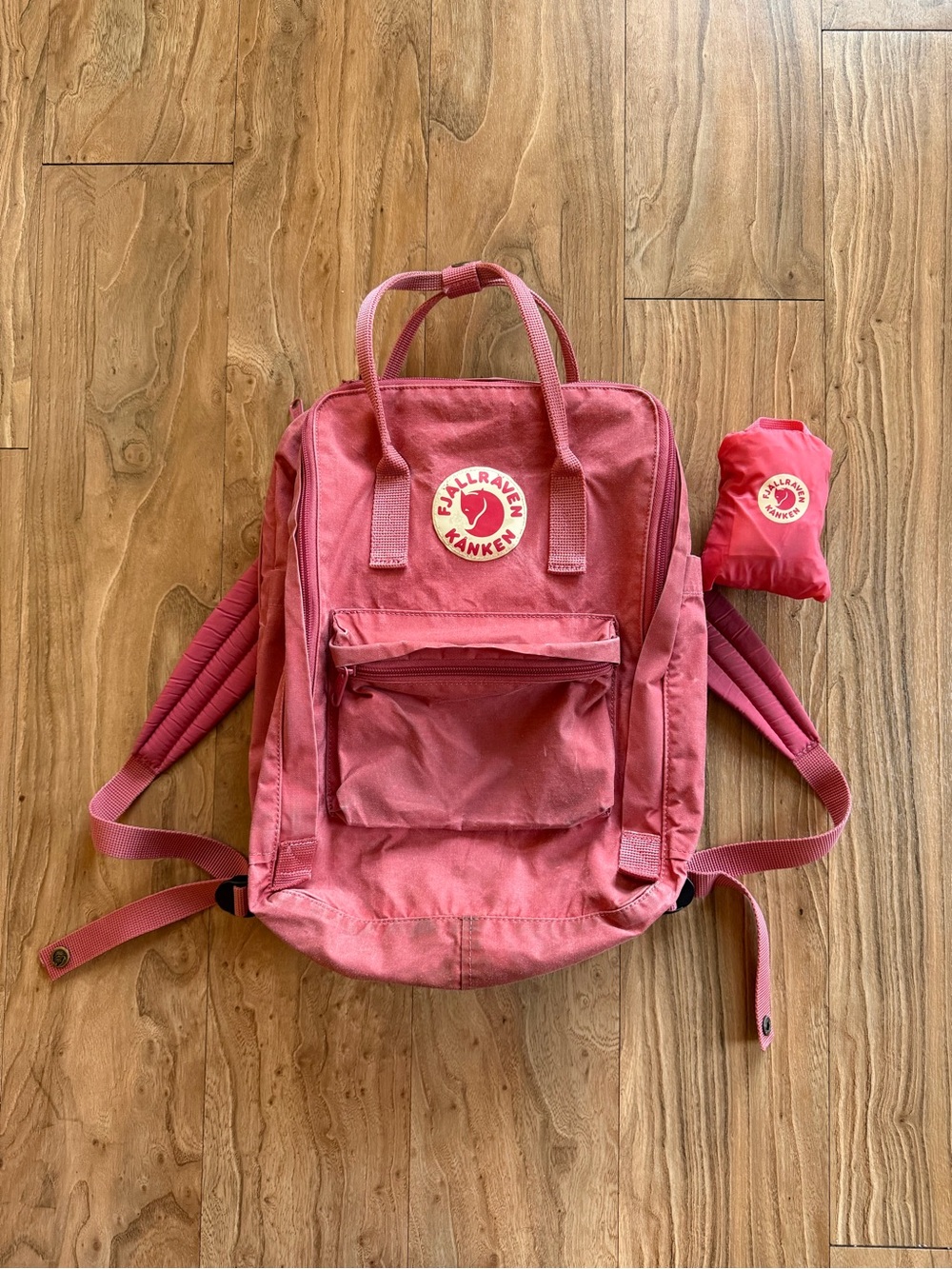 Fjallraven Kanken backpack with rain cover and extra strap pads